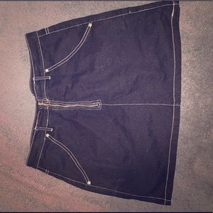 Mini black jean skirt w/ white threading.